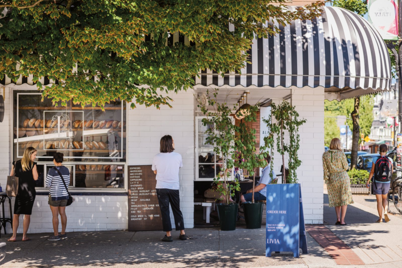 Neighbourhood cafe with striped awning